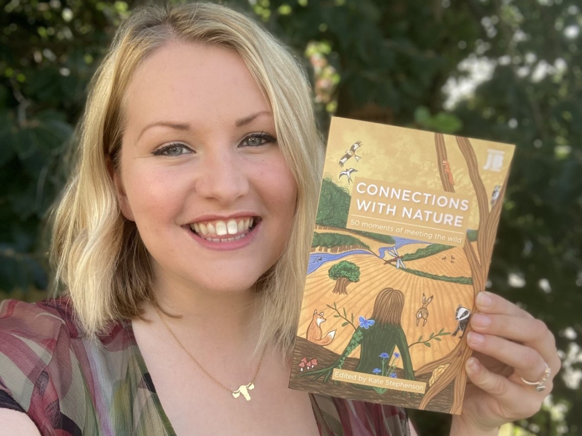 Kate on Conservation holds Connections with Nature book